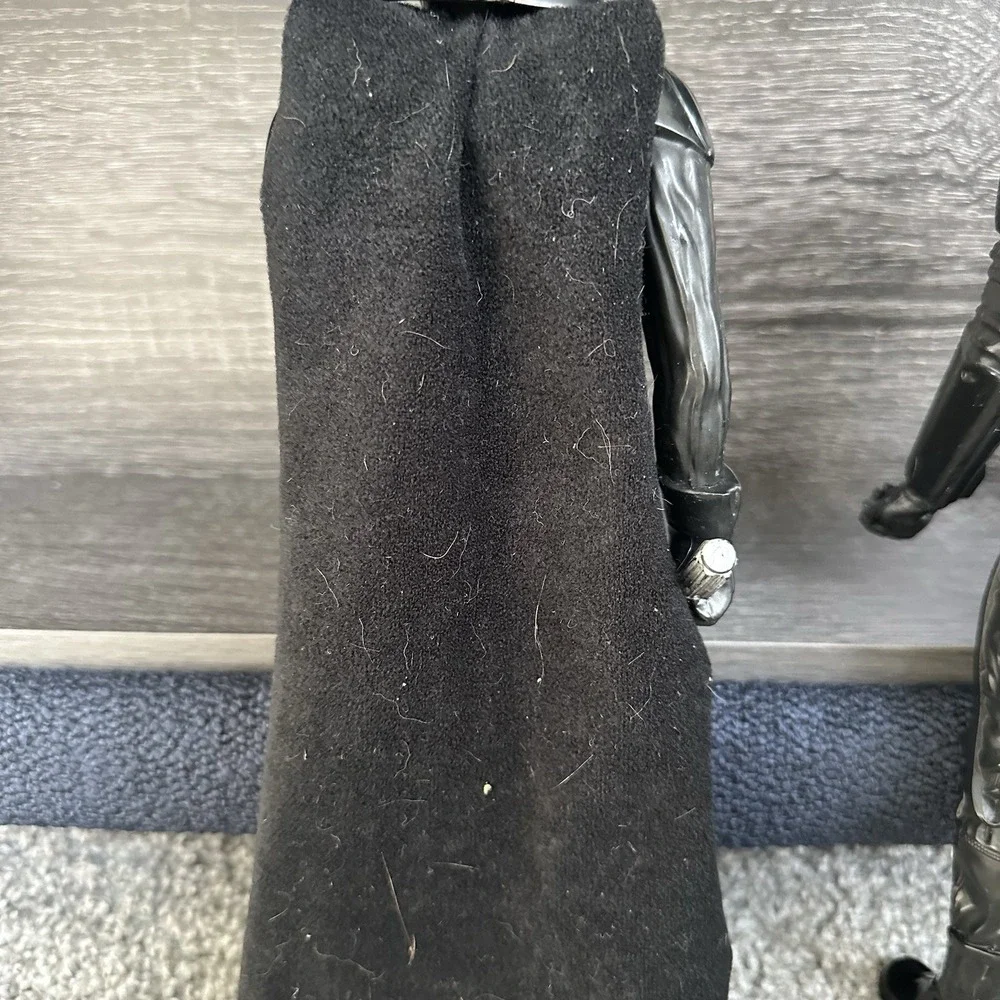 Star Wars action‎ figures Darth Vader, a TIE Fighter Pilot, Kylo Ren, and Finn